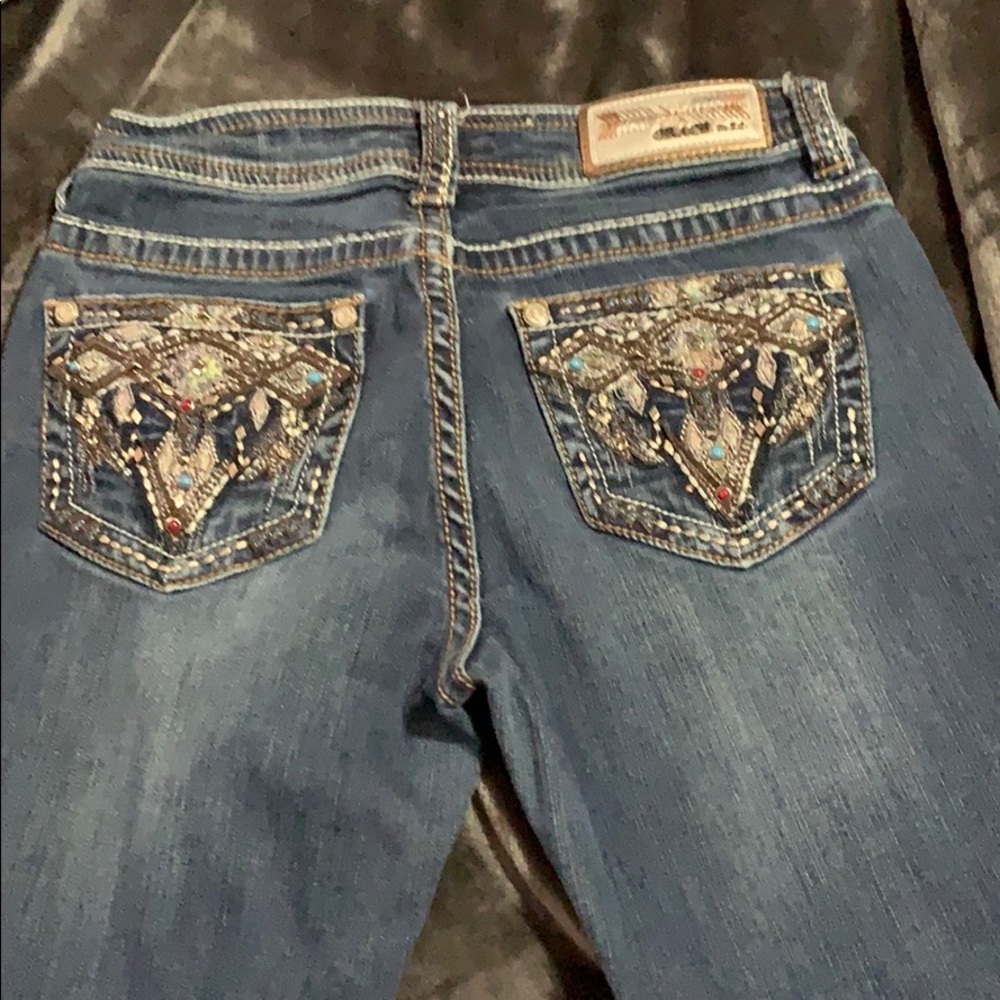 Gently used grace in LA jeans